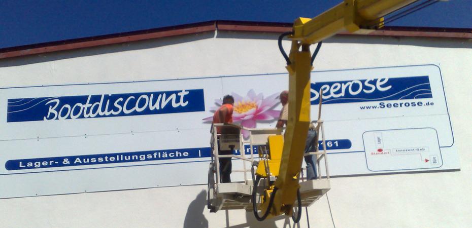 Glasfolien Werbung Fassadenbeschriftung Schild Schilder Bootdiscount Seerose
